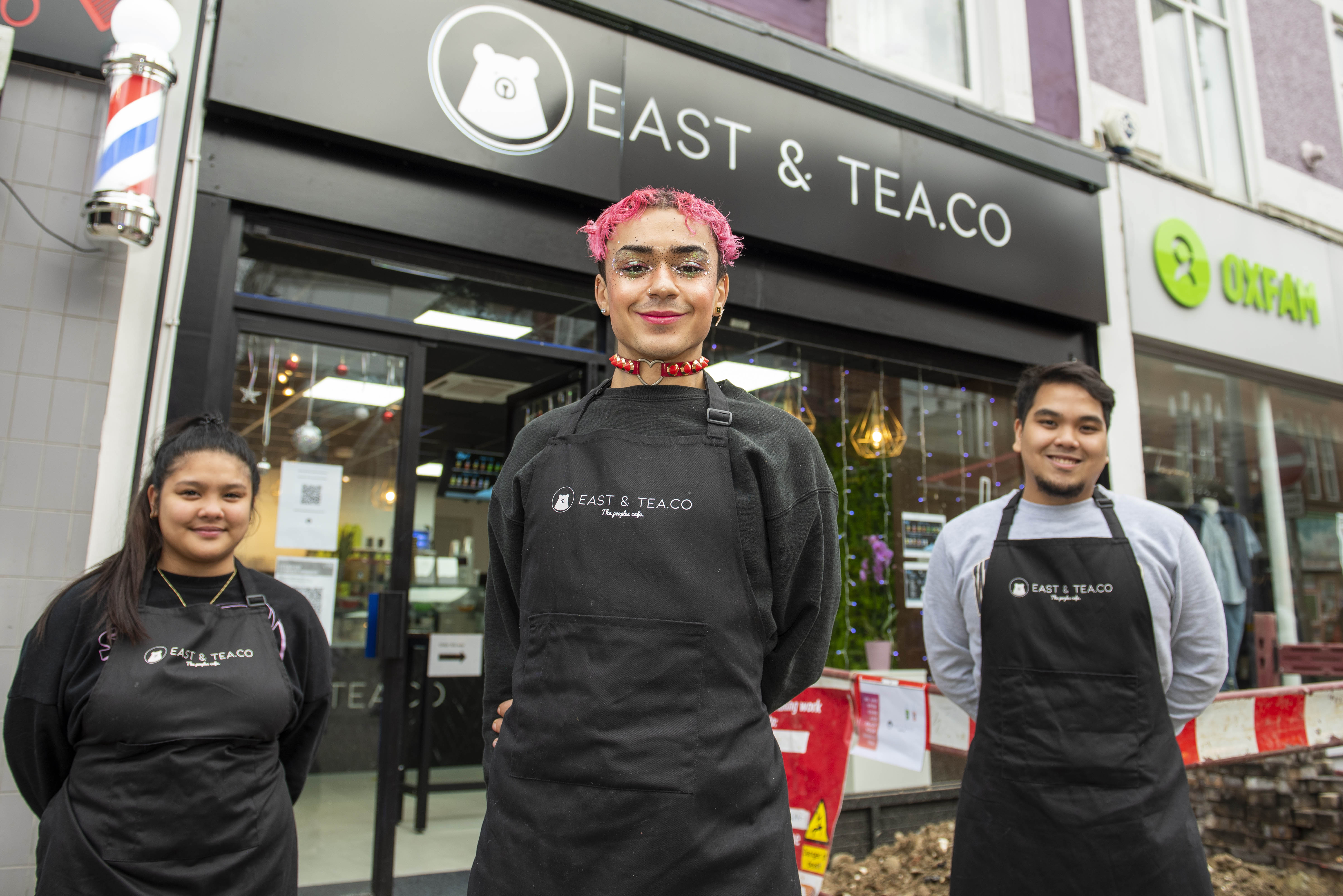 Workers outside East and Tea.Co